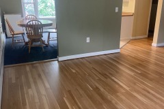 68 Piscataqua living room to fireplace w new floors.jpg